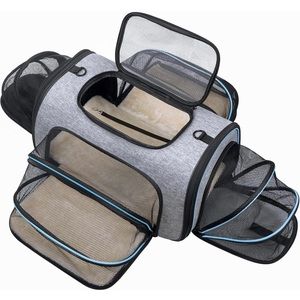 Dog Or per travel carrier.  New in box.  Expands for your pets comfort.